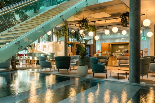 Actualité de CCHE pour l'aménagement d’un nouvel espace “work café” au cœur d’un atrium en Suisse