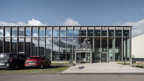 Architecture et Direction de travaux de CCHE pour la piscine de Marly Suisse