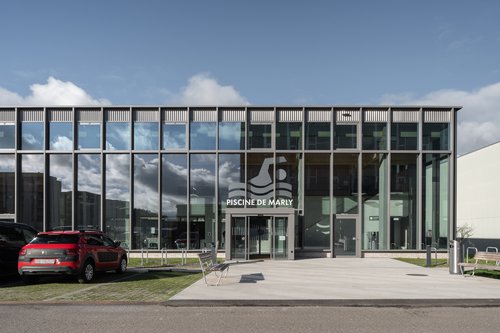 Architecture et Direction de travaux de CCHE pour la piscine de Marly Suisse